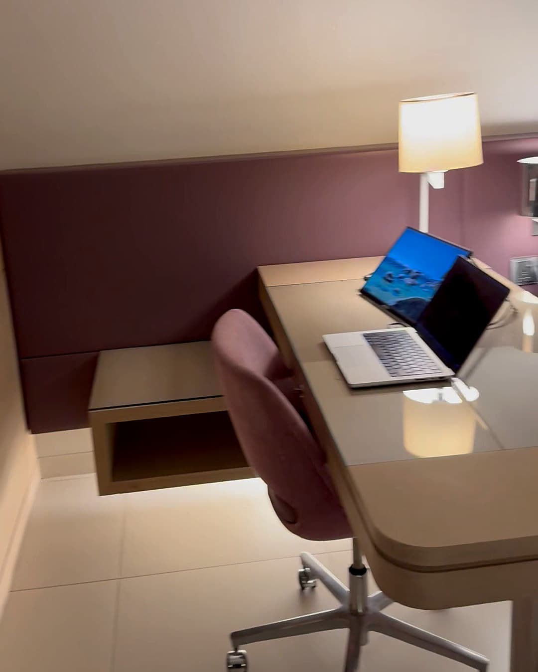 Desk with a laptop, table lamp and office chair in the studio at Capital Centre Arjaan, Abu Dhabi